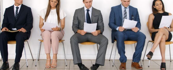 People sitting together waiting for their interview
