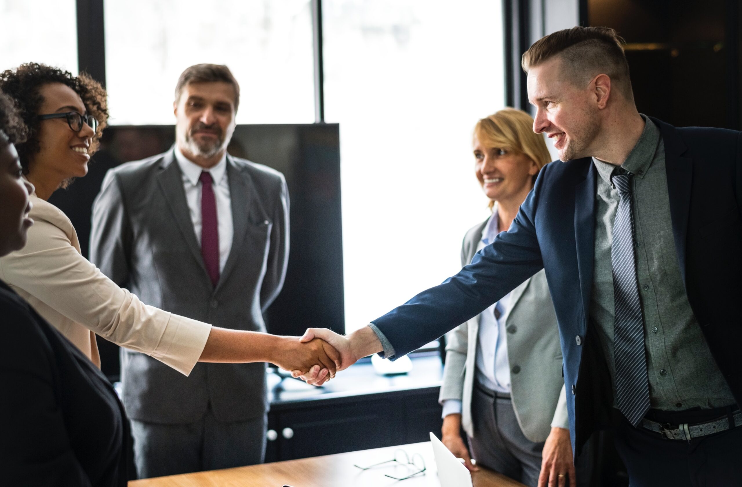 6015cfdeaade4288677e20ac_accomplishment-agreement-business-1249158 Accomplished business meeting